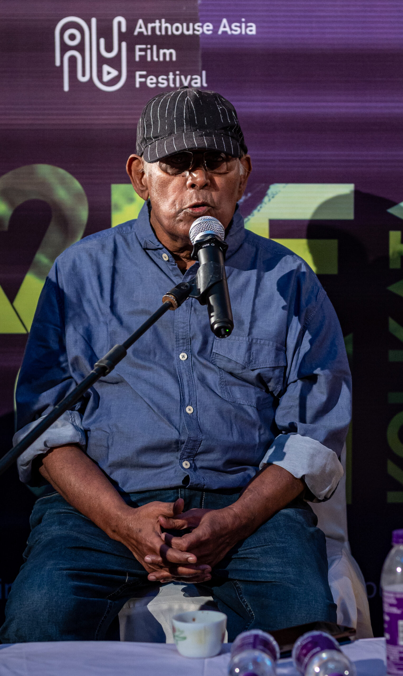 A man speaks at a public event